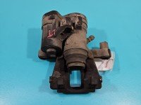 Zacisk tył lewy Vw Caddy IV 2.0 tdi HB