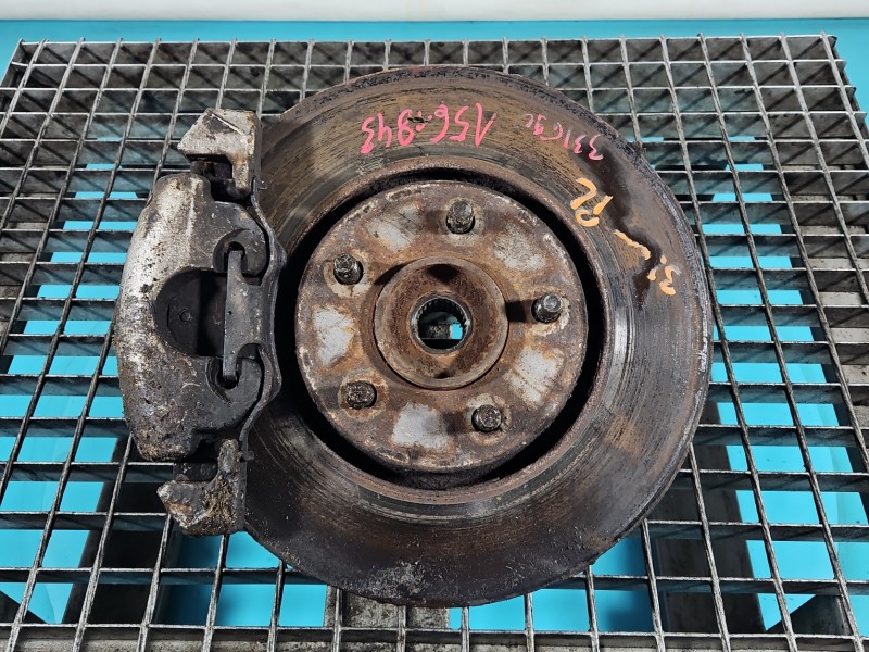 Zwrotnica lewa piasta przód 3.3 V6 Chrysler Voyager IV