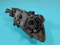 Reflektor lewy lampa przód Mitsubishi Lancer VII EUROPA