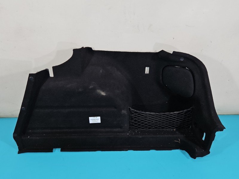 Tapicerka bagażnika prawa boczek Opel Astra IV J 39016116
