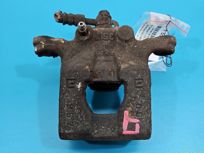 Zacisk tył lewy Nissan Qashqai I J10 06-13 1.6 16V HB