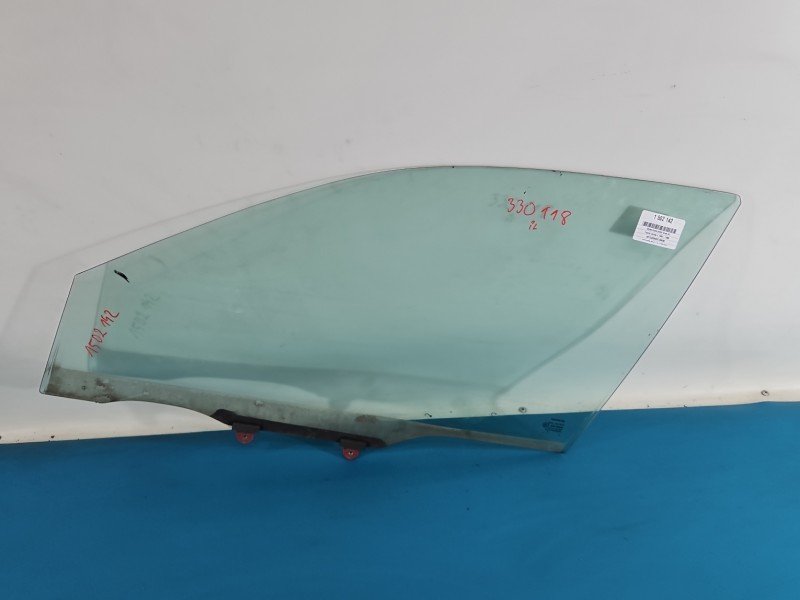 Szyba drzwi przód lewa Toyota Carina E sedan