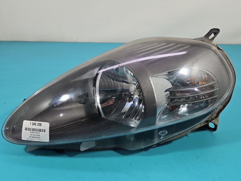 Reflektor lewy lampa przód Fiat Grande Punto EUROPA