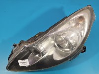 Reflektor lewy lampa przód Opel Corsa D EUROPA 13217453