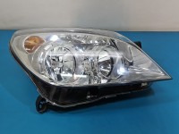 Reflektor prawy lampa przód Opel Astra III H EUROPA 1LG270370-54, 93190068RH