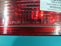 Lampa tył lewa Toyota Corolla E12 kombi 01-04 PRZED LIFTEM KOMBI Z LISTWĄ ŻARÓWKOWĄ / KOITO OE EUROPA
