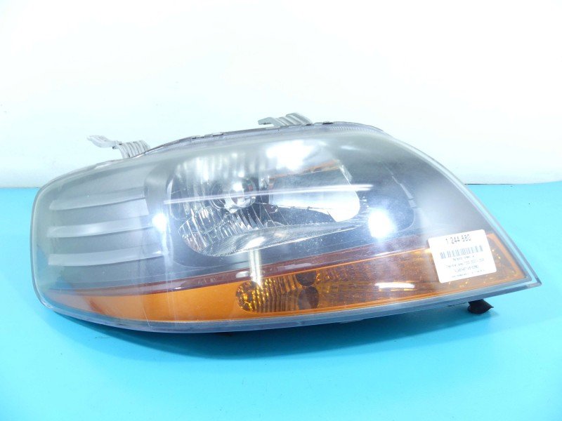 Reflektor prawy lampa przód Chevrolet Aveo T200 EUROPA