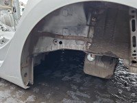 Błotnik tył lewy Opel Astra V K ćwiartka srebrny Z176