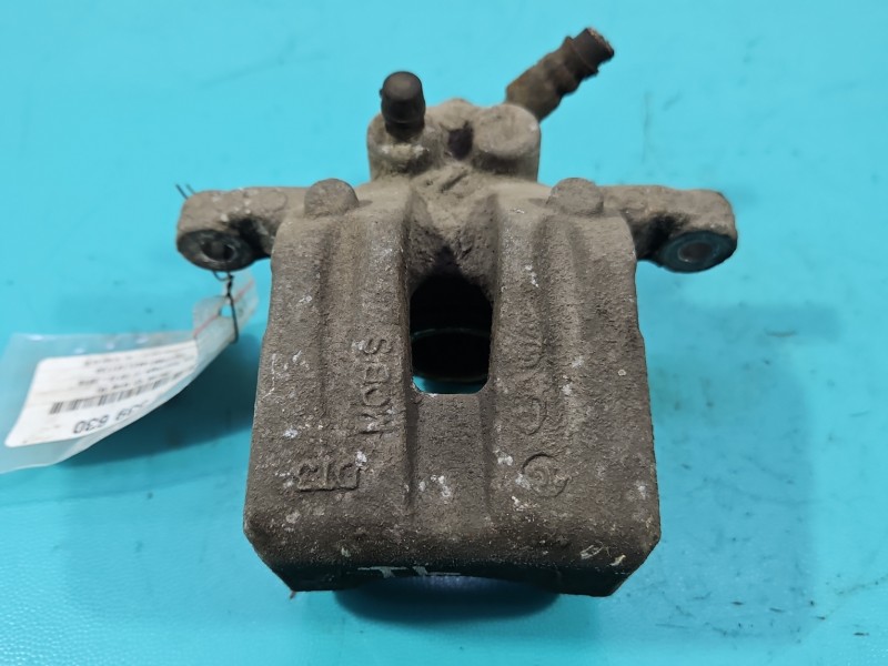 Zacisk tył lewy Kia Sportage III 10-15 1.6 GDI