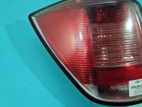Lampa tył lewa Producent części: OPEL, mikropęknięcia Z LISTWĄ ŻARÓWKOWĄ KOMBI Opel Astra III H kombi