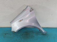 Błotnik przód lewy Toyota Yaris I srebrny 1E7