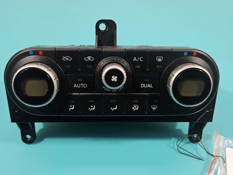 Konsola panel nawiewu Nissan Qashqai I J10 06-13 27500-JD45C