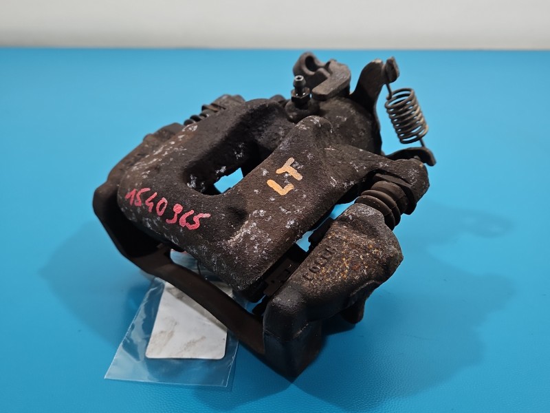 Zacisk tył lewy Toyota Auris II 1.8 hybryda kombi