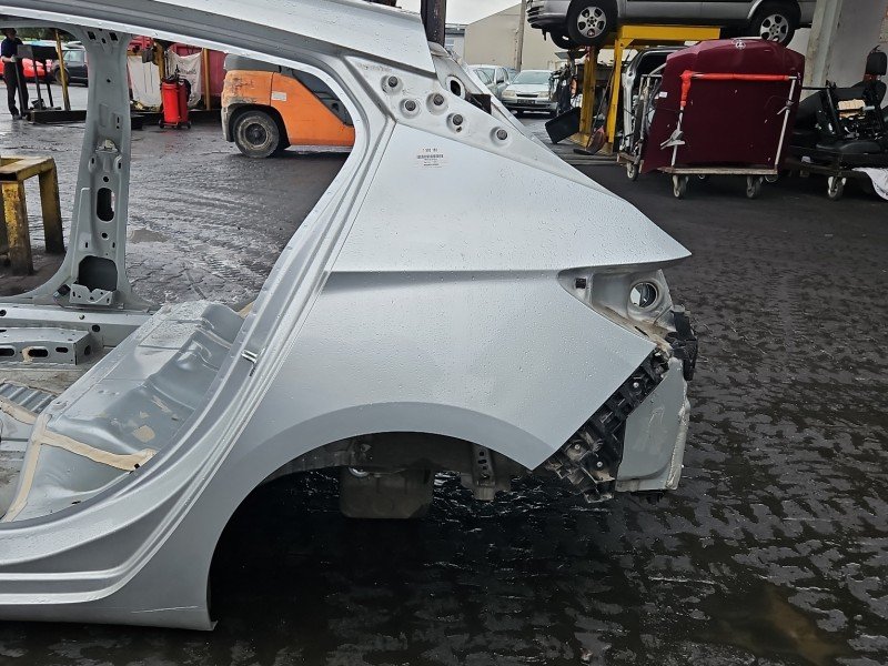 Błotnik tył lewy Opel Astra V K ćwiartka srebrny Z176