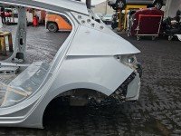 Błotnik tył lewy Opel Astra V K ćwiartka srebrny Z176