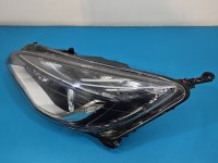 Reflektor lewy lampa przód Opel Astra IV J EUROPA 13253650