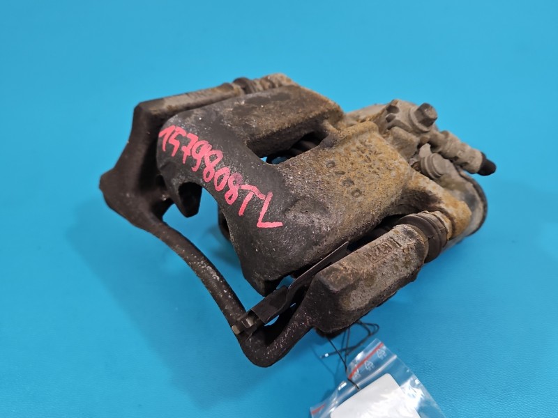 Zacisk tył lewy Vw Passat B7 kombi 2.0 tdi