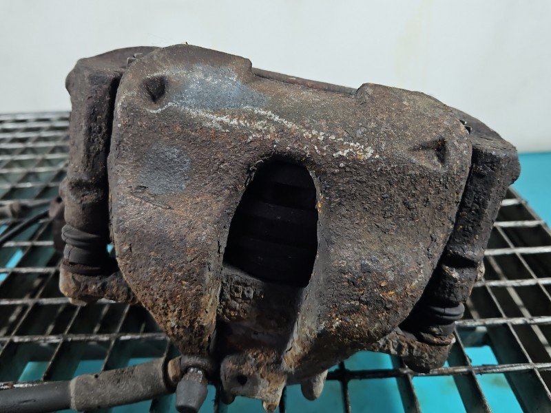 Zacisk przód lewy Peugeot 308 I T7 1.6 HDI