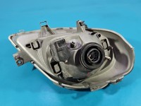 Reflektor lewy lampa przód Opel Vivaro EUROPA 7700311371, 91165719