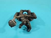 Zacisk tył lewy Opel Astra IV J 1.4 16V HB