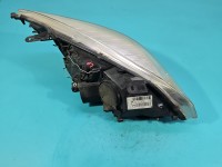 Reflektor lewy lampa przód Renault Megane III EUROPA 260600017R