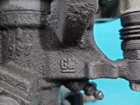 Zacisk tył lewy Opel Astra IV J 1.6 16v HB