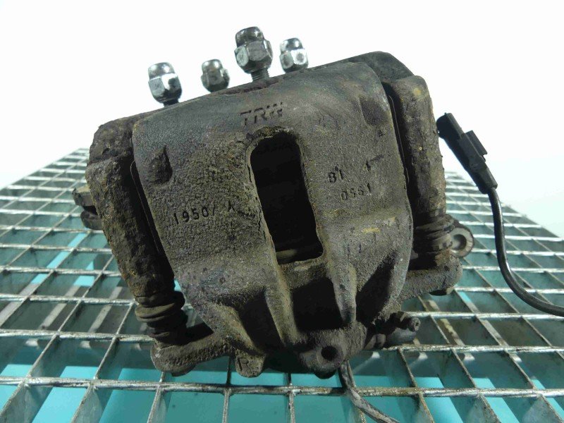 Zacisk przód prawy Nissan Micra K13 1.2 16V