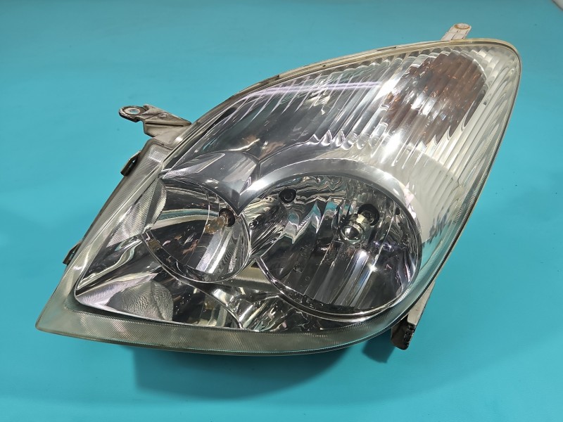 Reflektor lewy lampa przód Toyota Corolla Verso I EUROPA
