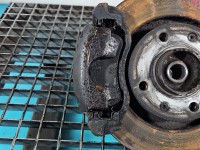 Zacisk przód lewy Peugeot 208 I 1.4 hdi