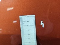 Błotnik przód lewy Kia Sportage III 10-15 pomarańczowy D2A