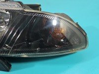 Reflektor lewy lampa przód Mitsubishi Carisma EUROPA