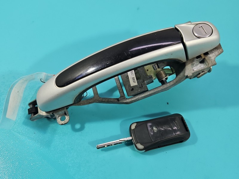 Klamka przód lewa zewnętrzna Porsche Cayenne I 9P 7L0837885F LC9Z