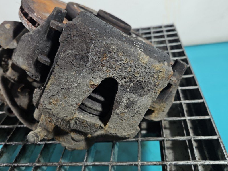 Zacisk przód lewy Skoda Fabia II 1.4 16V