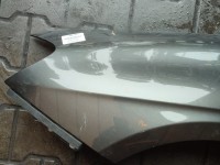 Błotnik przód lewy Lancia Delta III 08-14 grafitowy 284