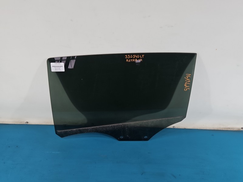 Szyba drzwi tył lewa Opel Astra VI L HB