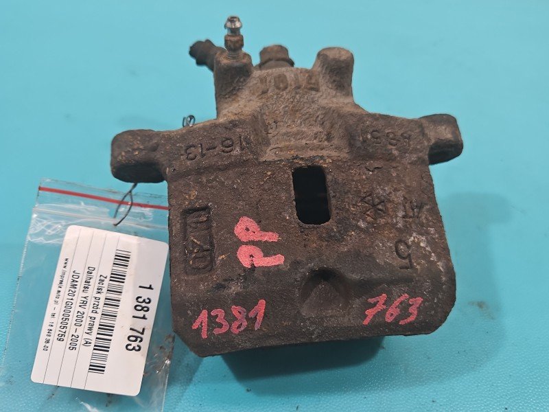 Zacisk przód prawy DAIHATSU YRV 00-05 1.3 16V Zacisk przód prawy DAIHATSU YRV 00-05 1.3 16V