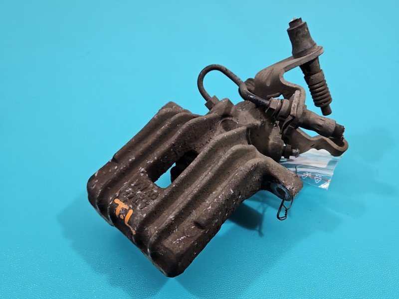 Zacisk tył lewy Skoda Yeti 1.2 TSI HB