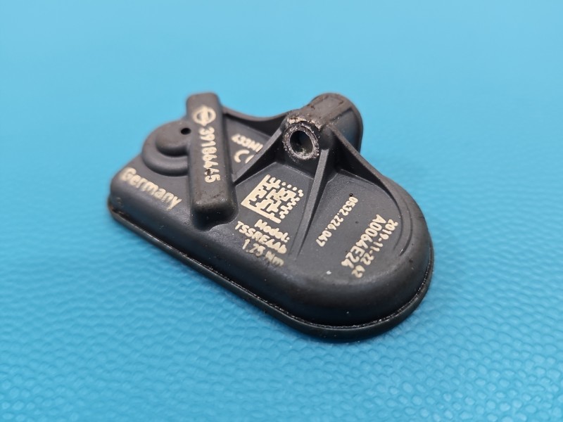 Czujnik ciśnienia opon Opel Astra V K 39186445 TPMS