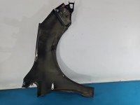 Błotnik przód lewy Opel Astra IV J grafitowy