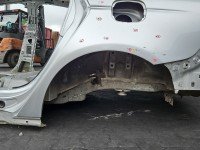 Błotnik tył lewy Ford Fusion USA 2012-2020 ćwiartka srebrny