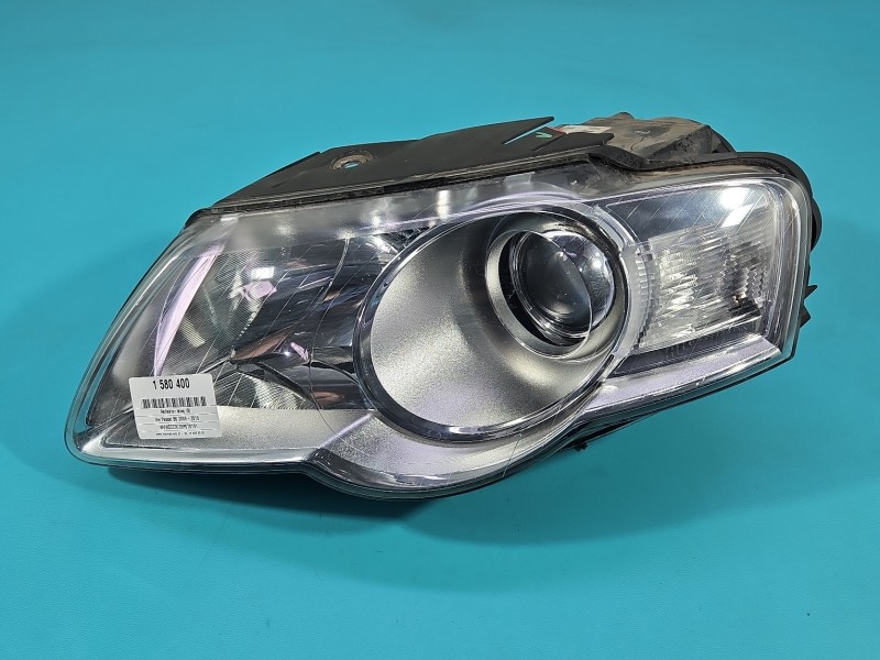 Reflektor lewy lampa przód Vw Passat B6 EUROPA 1EL247014