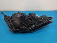 Reflektor lewy lampa przód Opel Astra IV J EUROPA 13253650