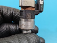 Wtryskiwacz benzyna 55577403 Opel Astra V K 1.4 T 125KM