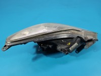 Reflektor lewy lampa przód Opel Corsa D EUROPA 13217453