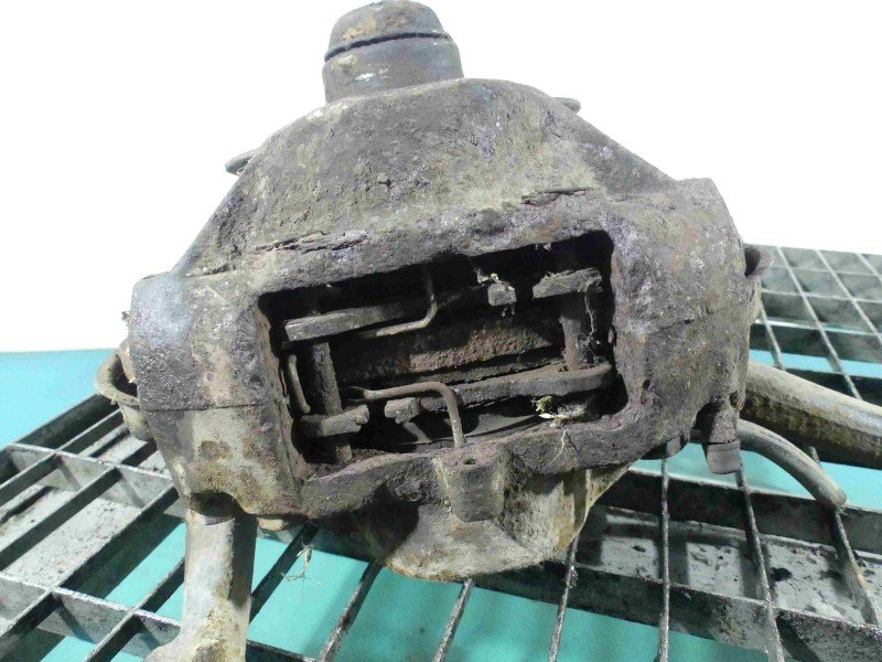 Zacisk przód lewy Mercedes 123 2.4 d