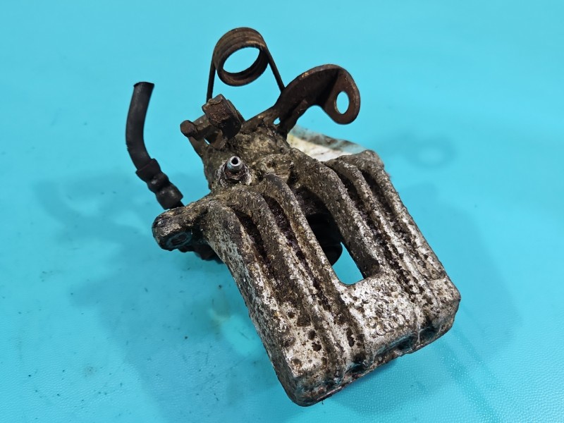 Zacisk tył lewy Audi A4 B7 1.9 tdi kombi