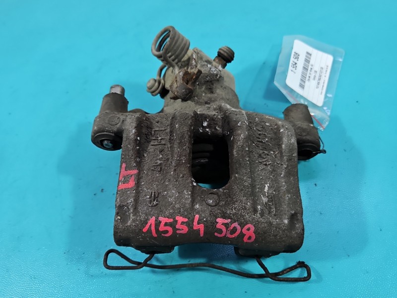 Zacisk tył lewy Volvo C30 1.6 hdi HB