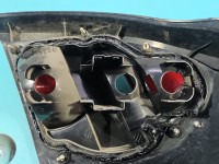 Lampa tył lewa Nissan Almera N16 HB 00-03 przed liftem hatchback Z LISTWĄ ŻARÓWKOWĄ EUROPA