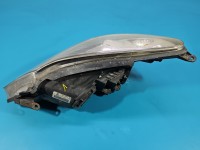 Reflektor prawy lampa przód Opel Corsa D EUROPA 13217454
