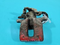 Zacisk tył lewy Toyota Auris I 1.4 VVT-I HB